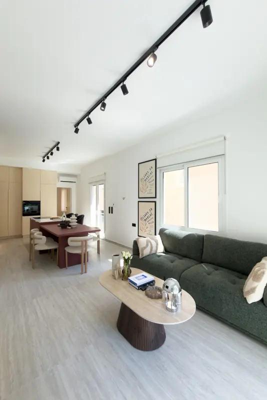 Living room with green sofa — Kypseli project