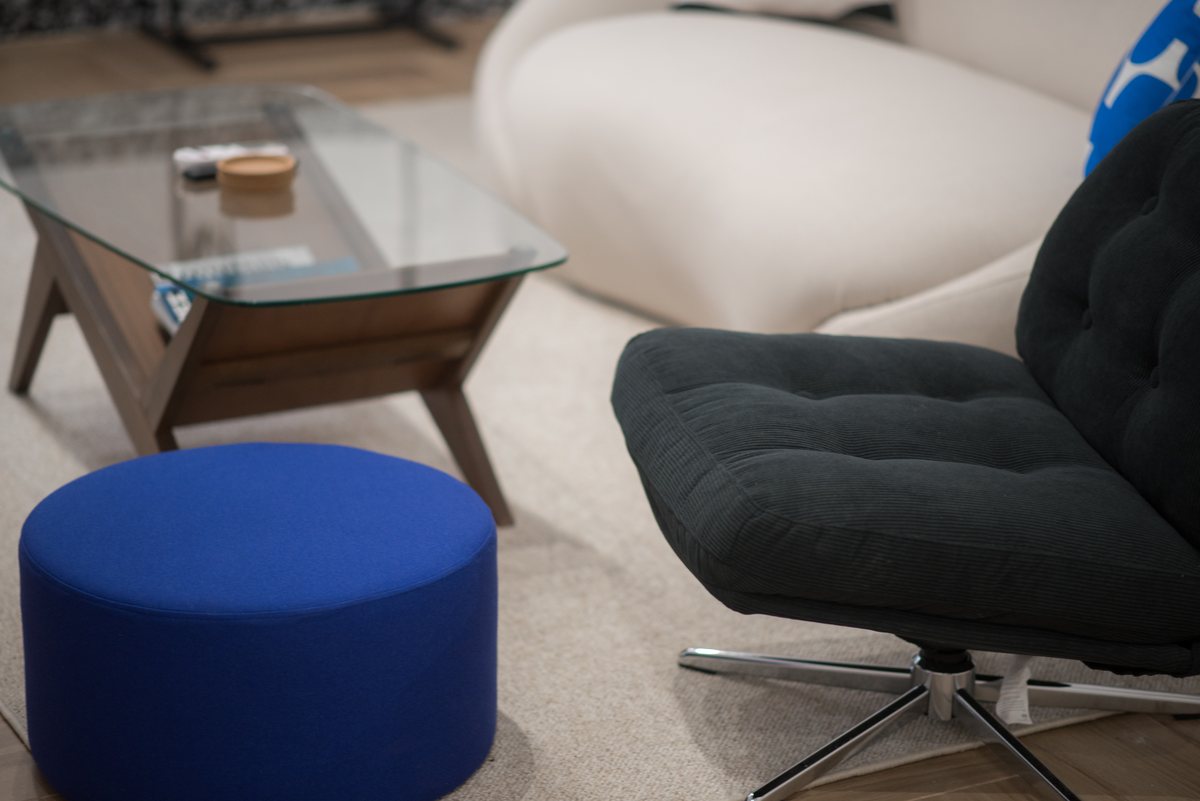 Pouf and armchair in the living area