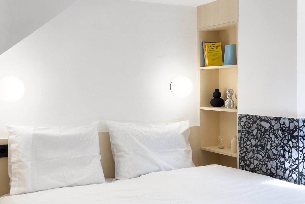 The double bed with shelving