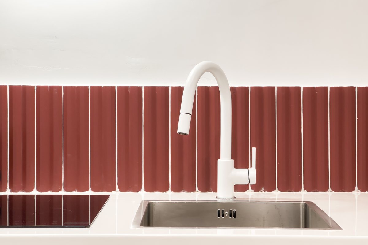 Sink with red tiles