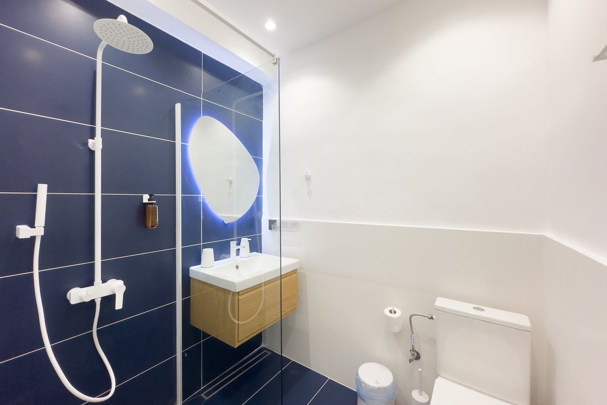 Bathroom with blue tiles