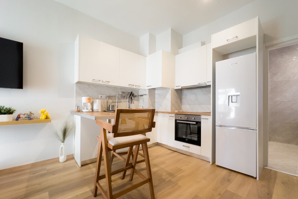 White kitchen with wooden worktop