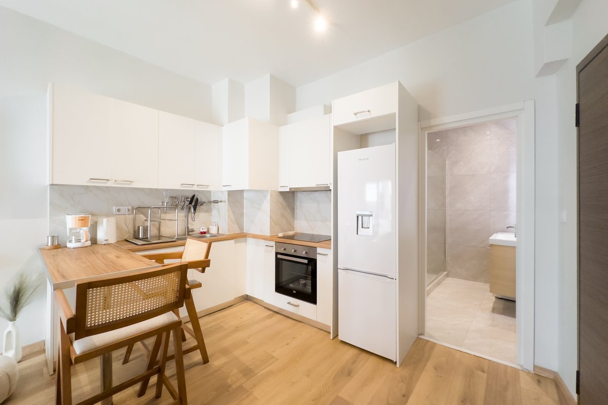 Kitchen with oven and fridge